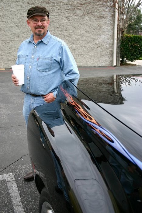 Harry next to his cool Chevy SSR.