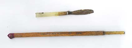 Old style brush handle and quill.