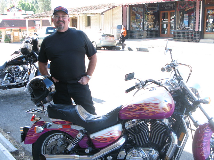 Harry on a bike ride up to Yosemite, sandwiched between his two road bikes with his own paint.