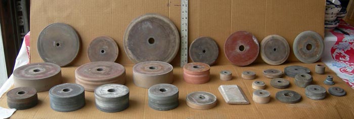 nice looking variety of small wheels. . .many look to have been originally used for edging