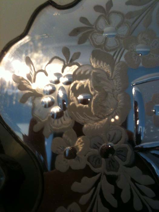 Side detail of painted reverse glass with silvered engraved glass border.JPG